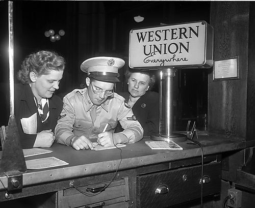 Serviceman Fills Out Western Union Telegram