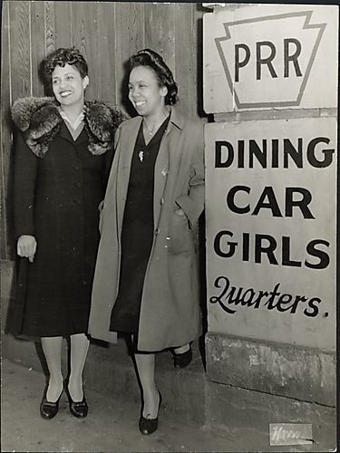 Two women next to PRR Dining Car Girls Quarters" sign"