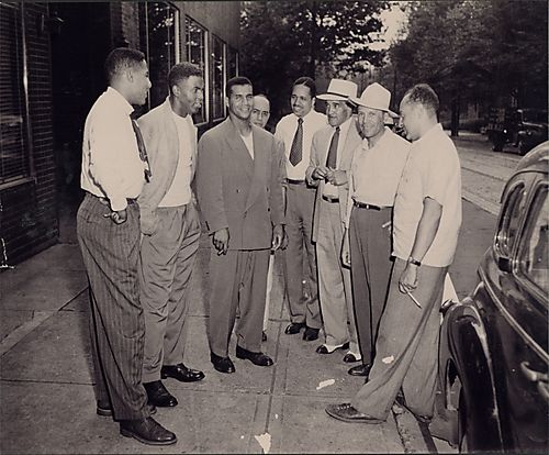 Bill Nunn, Sr., Pittsburgh Courier city editor, Brooklyn Dodgers players Jackie Robinson and Roy Campanella, with Courier sports reporter Chester Washington, and Mr. Horne