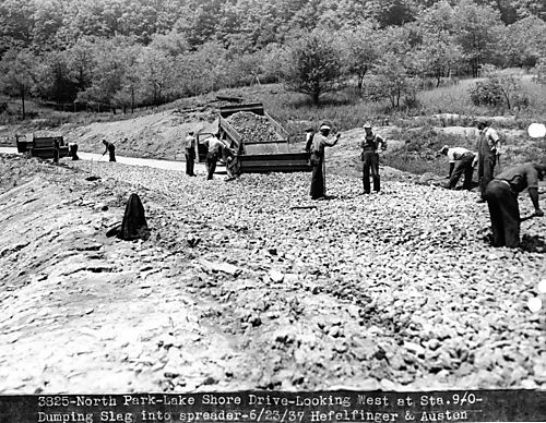 North Park - Lake Shore Drive - Dumping Slag into Spreader
