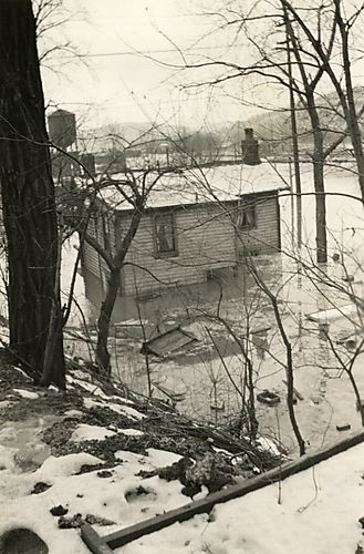 House Surrounded by Debris