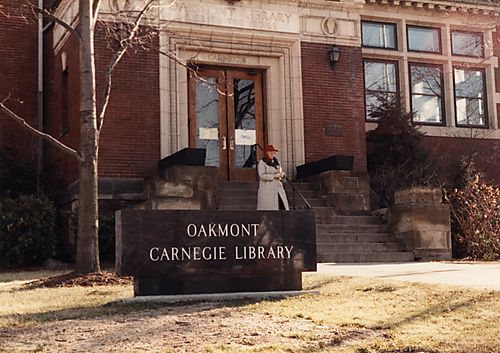 A Patron Exits the Oakmont Carnegie Library