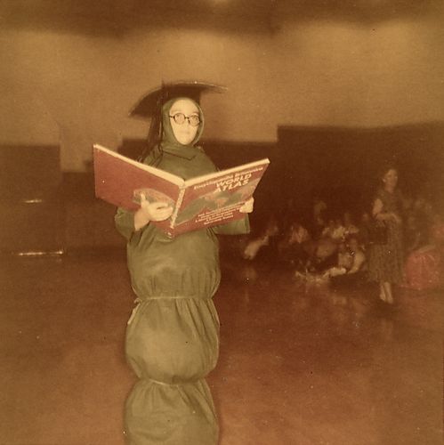 An Individual in a Book Worm Costume