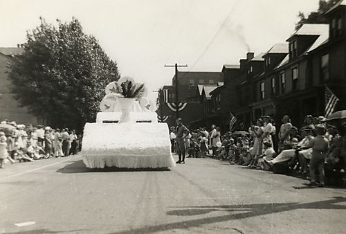 Onlookers Admire a Float