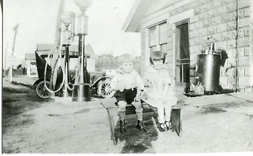 Sloop Brother and Sister in Front of Garage