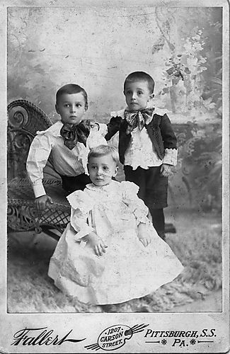 Portrait of three young children