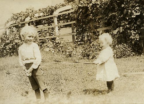 Children playing in a yard