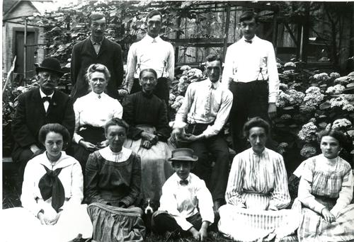 Denny Family in front of Garden