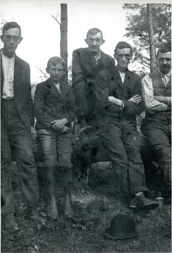 Denny Men on a Log