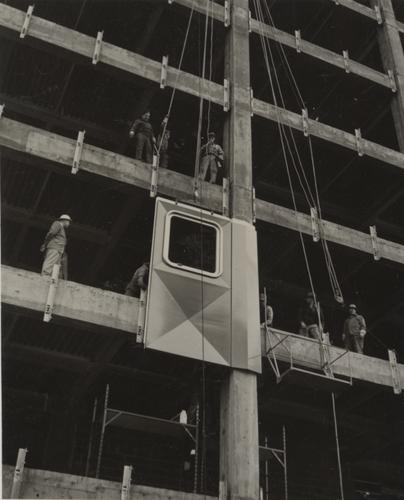 Attaching a panel to the Alcoa Building