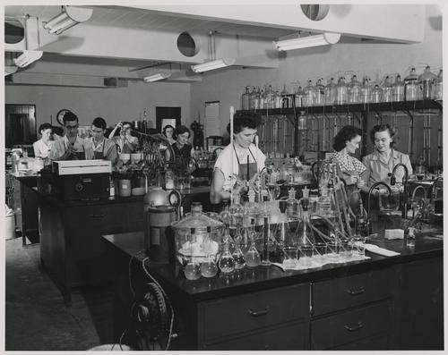 Employees working in chemical laboratory of Columbia-Southern Chemical Corporation