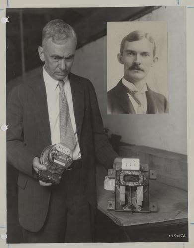 Frank Conrad with Shallenberger meter at exhibit for Ford Museum