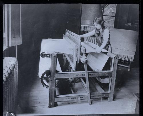 Woman at weaving machine