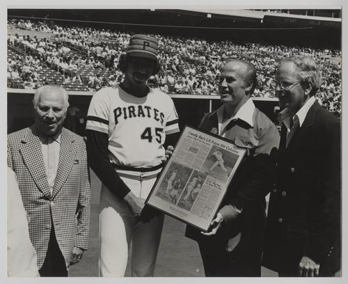 Pittsburgh Pirates pitcher John Candelaria and Clark Candy Company executives commemorating no-hitter