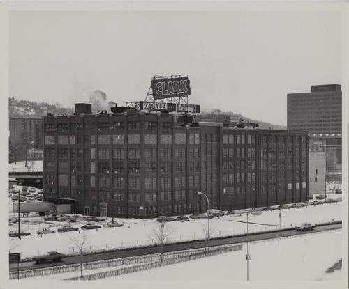 D. L. Clark Company Building exterior featuring Clark Bar, Zagnut Bar, and Crispy bar signs