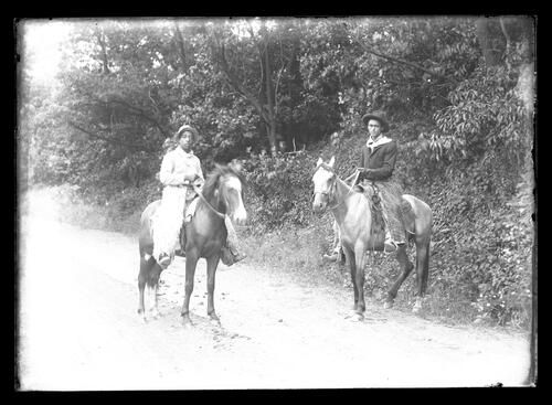 Two Men on Horseback