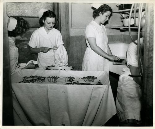 Nurses Cleaning Surgical Equipment