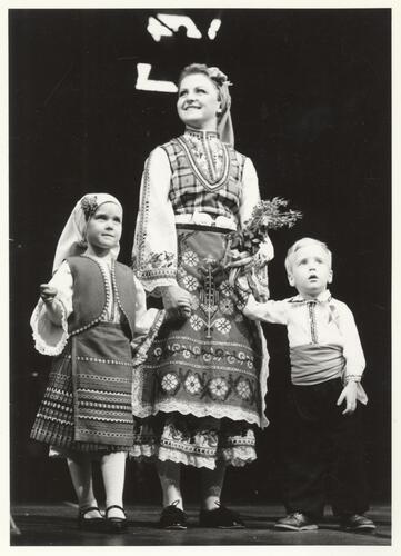 Woman and children on stage