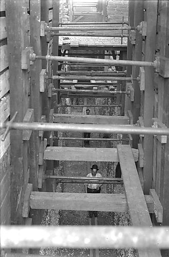 Men in Pipe Trench
