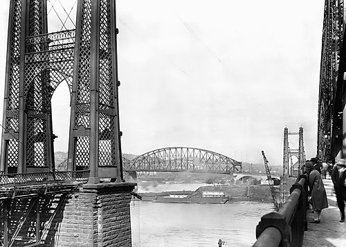 People Watching Bridge Destruction