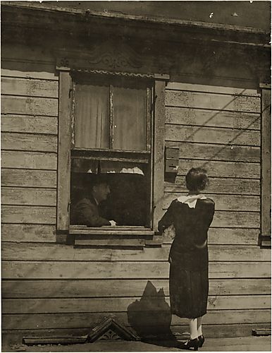 (Neighborhoods: Woman Talking to Man in Window)
