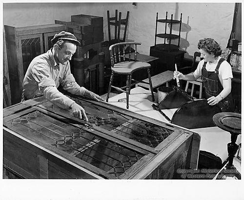 Members of the Veterans Education Program Refinishing Furniture
