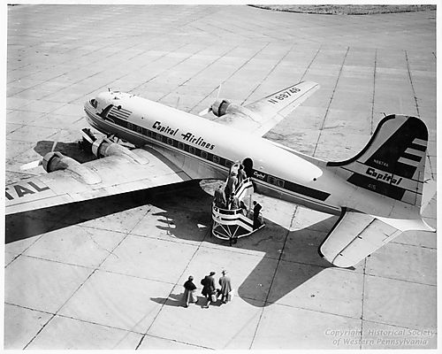 Passengers boarding Capital Airlines Plane