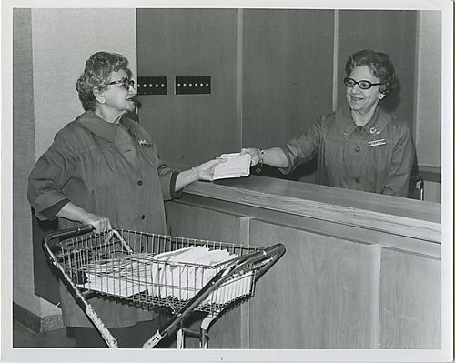 Ladies' Hospital Aid Society volunteers at the hospital information desk 