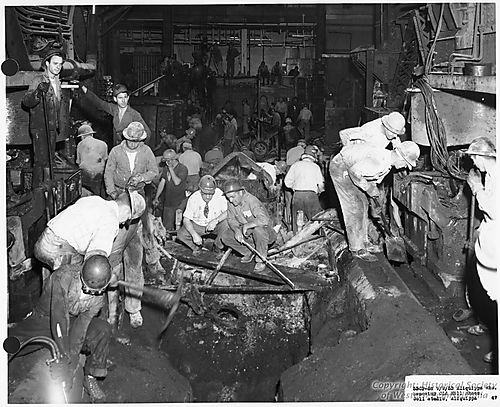 Workers removing Old Mill Shoes