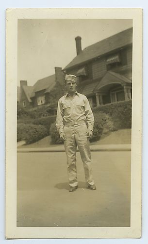 Unidentified soldier standing in the street