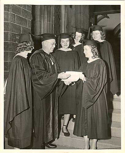 Former President Spencer greets graduates at commencement