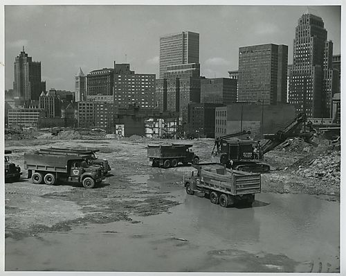 Dumptrucks and bulldozer on construction site