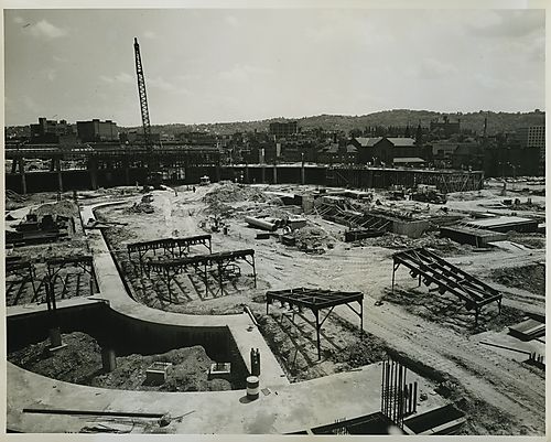 Crane constructing wall of Civic Arena